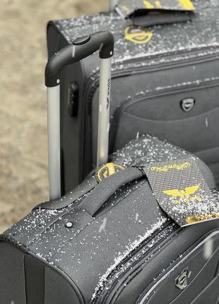 Надежный чемодан на 2 колеса,польнее,кодовый замок,wings,дорожняя сумка,сумка на колесах5 фото