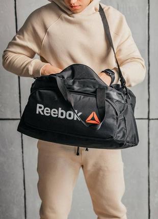 Мужская спортивная сумка reebok. вместительная, качественная, ткань оксфорд. черная.1 фото