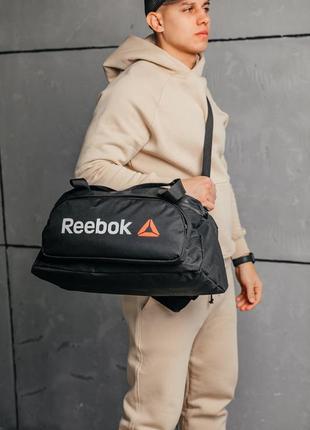 Мужская спортивная сумка reebok. вместительная, качественная, ткань оксфорд. черная.6 фото
