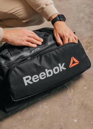 Мужская спортивная сумка reebok. вместительная, качественная, ткань оксфорд. черная.2 фото