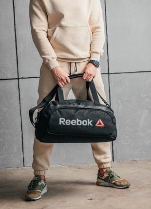 Мужская спортивная сумка reebok. вместительная, качественная, ткань оксфорд. черная.7 фото