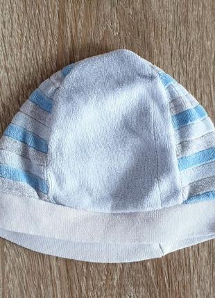 Велюровая шапочка голубого цвета.1 фото
