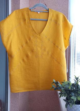 Красивая качественная льняная блуза с вышивкой свободного силуэта10 фото