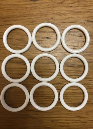 Кільце для карнизу трубчастого, біле ,пластикове,внутрішній діаметр 28 мм.
