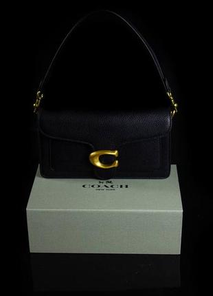 Кожаная сумочка в стиле coach