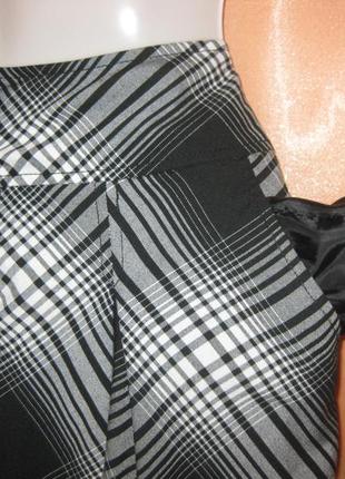 Модная удобная миди объемная юбка в клетку h&m км1549 с двумя глубокими карманами по бокам4 фото