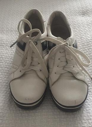 Кросівки шкіряні білі
