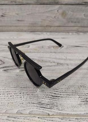 Сонцезахисні окуляри вінтажні, круглі, чорні, унісекс у пластиковій оправі3 фото