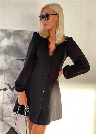 Платье черное на длинный рукав с вырезом в зоне декольте на пуговицах короткая стильная трендовая1 фото