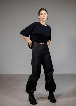 Штани-карго жіночі oversize з кишенями чорні modna kazka mkaz6412-16 фото
