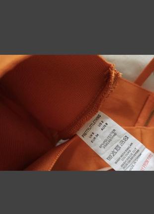 Топ оранжевый на змейке шорты джинсовые высокая посадка5 фото