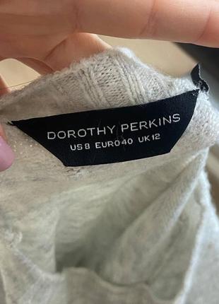 Теплящий свитерик от dorothy perkins с интересными разрезами🤍7 фото