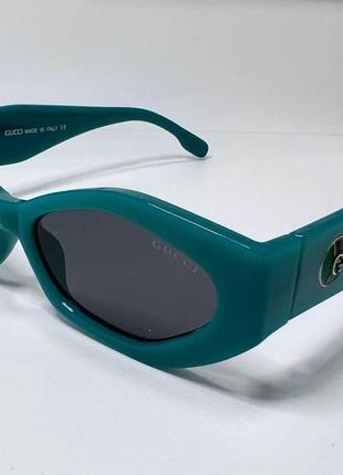 Очки солнцезащитные женские с черными линзами в зеленой пластиковой легкой оправе1 фото