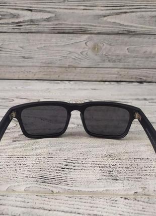 Солнцезащитные очки черные, матовые, унисекс в пластиковой оправе6 фото