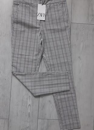 Брюки в клетку zara