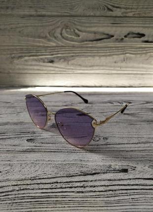 Солнцезащитные очки женские в металлической оправе1 фото