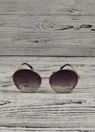 Солнцезащитные очки женские круглые в металлической оправе2 фото