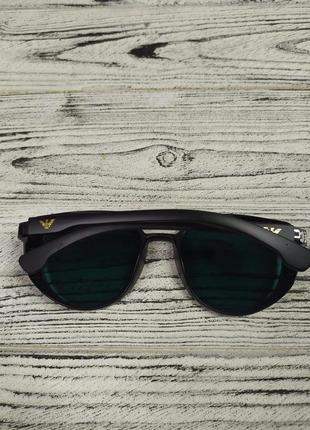 Сонцезахисні окуляри жовтогарячі унісекс у пластиковій оправі4 фото