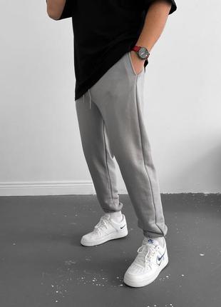 Теплые спортивные штаны на флисе / мужские серые спортивки3 фото