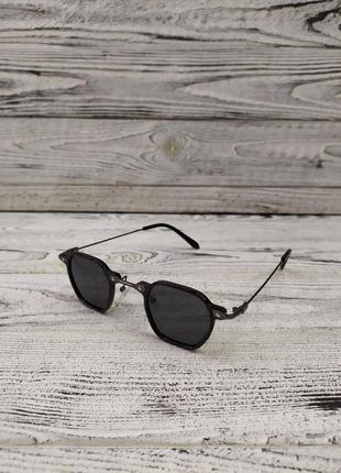 Солнцезащитные очки черные, унисекс в пластиковой и металлической оправе2 фото