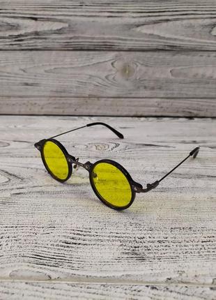 Сонцезахисні окуляри круглі, жовті в пластиковій та металевій оправі2 фото