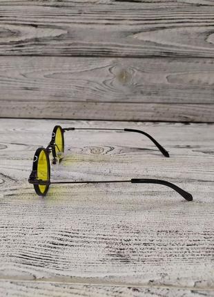 Сонцезахисні окуляри круглі, жовті в пластиковій та металевій оправі7 фото