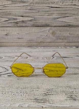Солнцезащитные очки  унисекс в металлической оправе2 фото