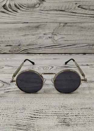 Солнцезащитные очки унисекс, круглые, черные в серебристой металлической оправе ( без бренда )2 фото