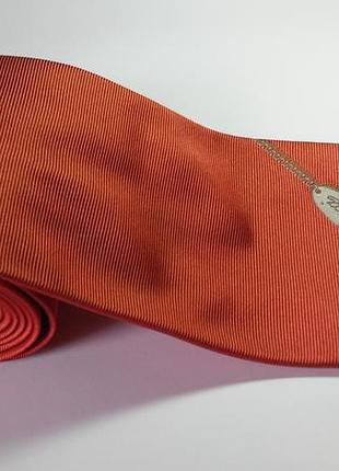 Оригинальный галстук бренда guccii