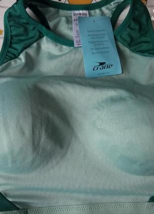 Зелений спортивний бюстгальтер топ фірми crane розмір s