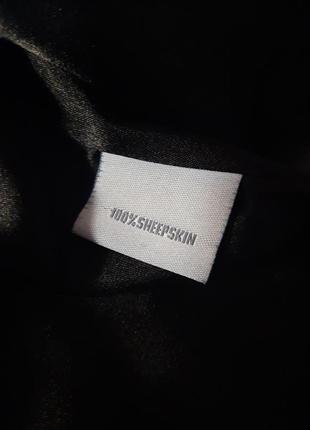 Шкіряна куртка приталеного силуету8 фото