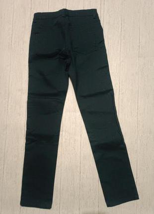 Стильные и плотные подростковые джинсы от tchibo нитевичка, размеры 146/1528 фото