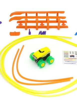 Машинка на бат. trix trux набір з трасою (жовтий)3 фото