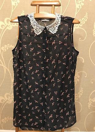 Очень красивая и стильная брендовая блузка в птичках.