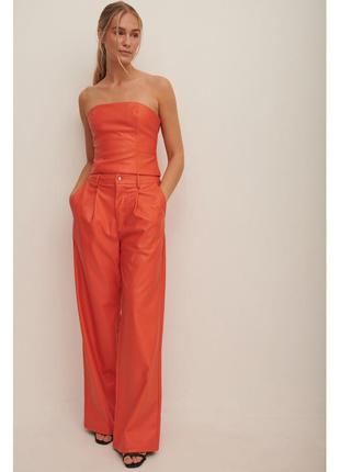 Нереальні брюки зі штучної шкіри