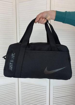 Жіноча спортивна сумка nike, чорна дорожня сумка найк у спорзал на довгому ремінці1 фото