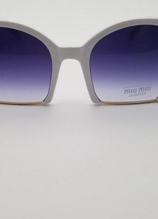 Солнцезащитные очки miu miu2 фото