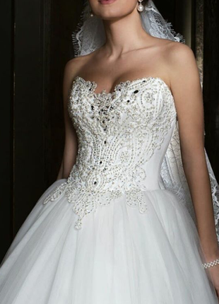 Розкішна весільна сукня від оксани мухи5 фото