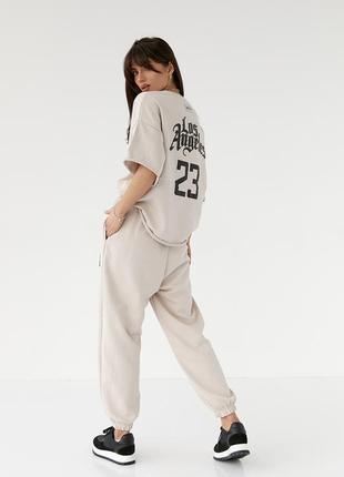 Женский спортивный костюм с футболкой и штанами оверсайз фасон2 фото