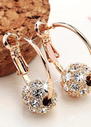 Стильні сережки з камінням біжутерія жіночі золотисті cvf753