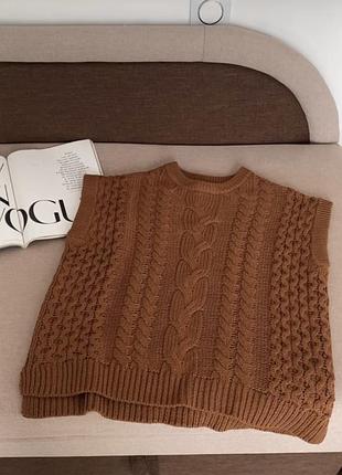 Жилет у коси