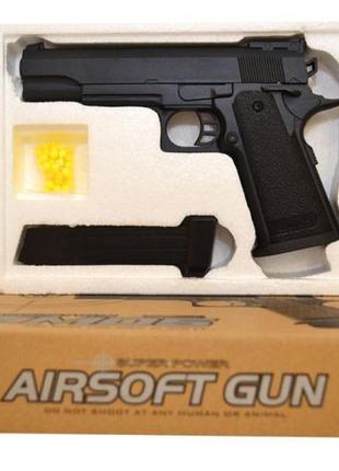 Пистолет металлический детский, стреляет пластиковыми пулями 6 мм zm 051 фото