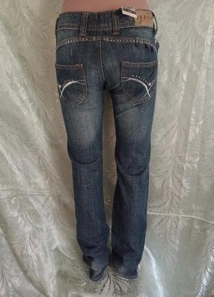 Тоsezim fashion jeans. 27-го розміру джинсики весняні із заклепками.1 фото