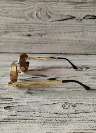 Солнцезащитные очки круглые коричневые унисекс в металлической оправе3 фото