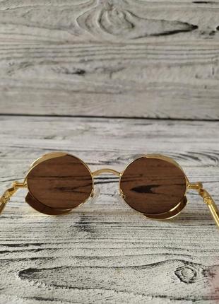 Солнцезащитные очки круглые коричневые унисекс в металлической оправе5 фото