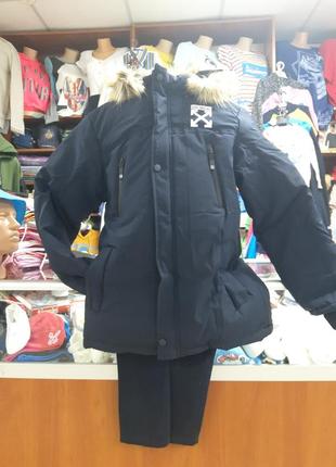 Зимняя удлиненная куртка пуховик пальто на овчине для мальчика синяя р.134-1644 фото