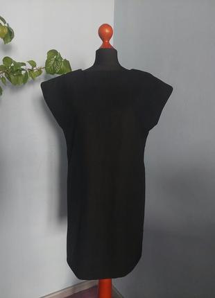 Стильна тепла лаконічна базова сукня чорного кольору3 фото