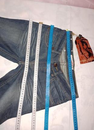 Новые джинсы 👖 клешь качественные темные фирменные5 фото