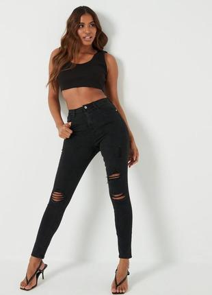 Missguided. англія. джинси скіні із завищеною посадкою з рваними елементами.