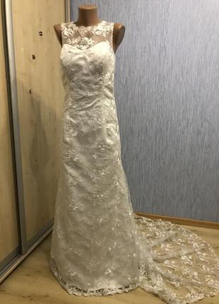 Шикарное свадебное платье со шлейфом2 фото